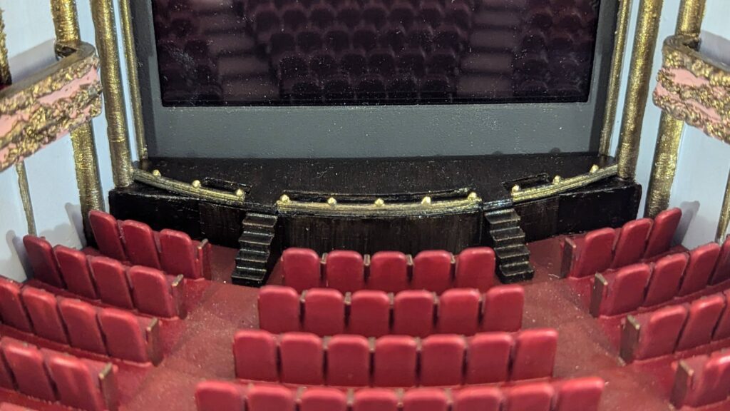 View of the seats and stage of the theatre